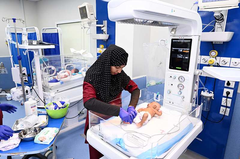 Nursing Staff Attend to Newborns on World Nursing Day at Sindh Institute of Child Health and Neonatology