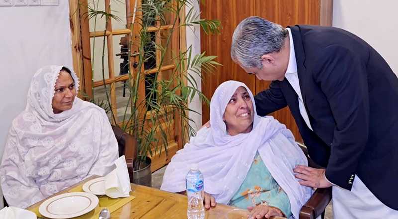 Federal Minister for Interior Mohsin Naqvi meets the families of police personnel martyred in Bannu during his visit to the Police Headquarters