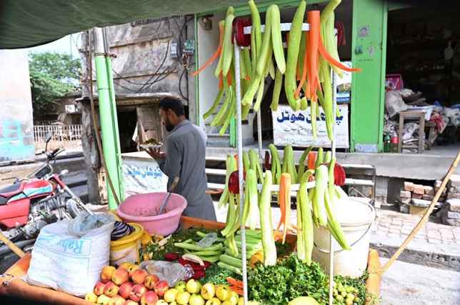 Street Vendor Sells Salad at Railway Chowk