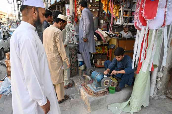 Blacksmiths Busy Sharpening Tools for Eid Ul Adha Sacrifice