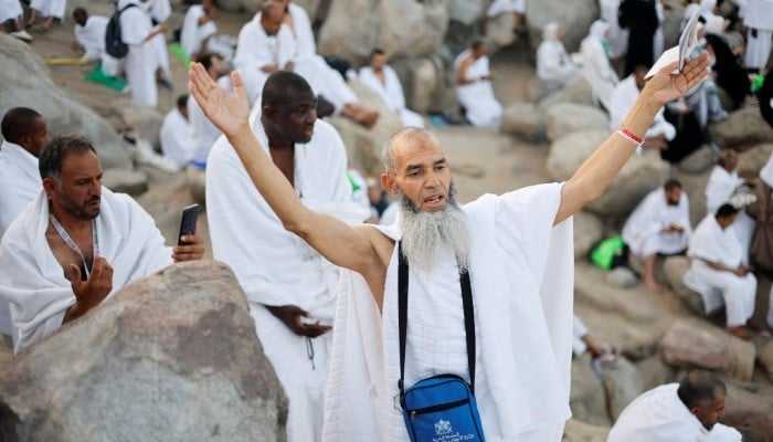 In pictures: Pilgrims pray on Mount Arafat as Hajj reaches peak