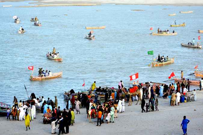 Families Enjoying Boat Rides at Indus River During Third Day of Eid-ul-Azha