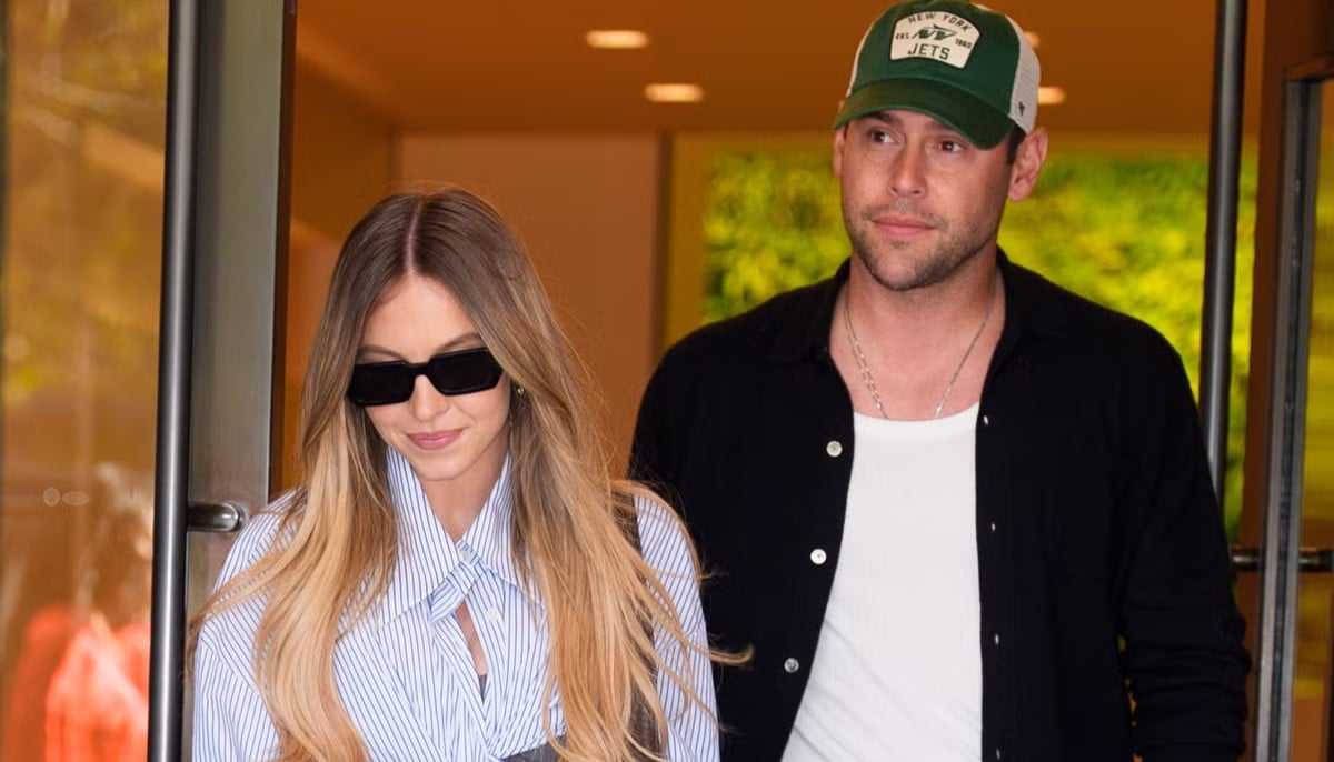 Sydney Sweeney holds hands with Scooter Braun during latest outing