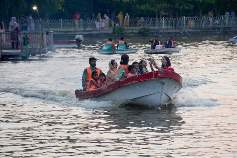 Family Boats at Race Course Park as Visitors Enjoy Holiday