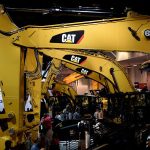 Caterpillar profit declines amid soft demand; forecasts yearly sales impact from tariffs.