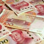 Yuan edges lower in China