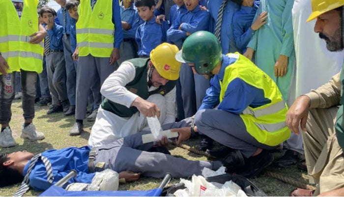 In AJK, kids practice safety amid Pakistan-India conflict.