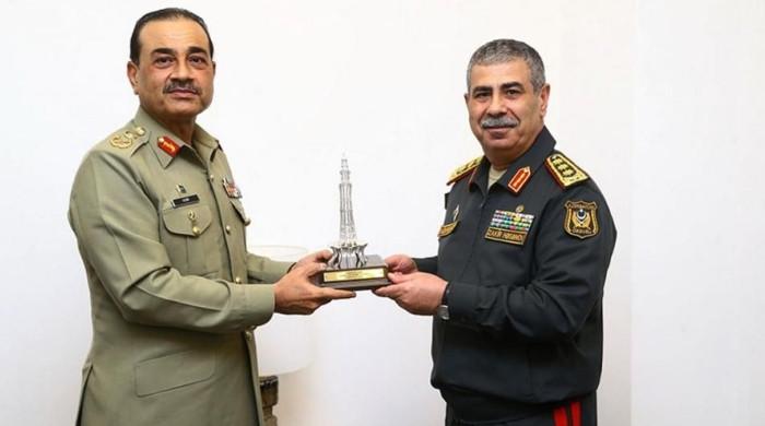 Munir and Azerbaijani Defence Minister Talk Regional Security Situation