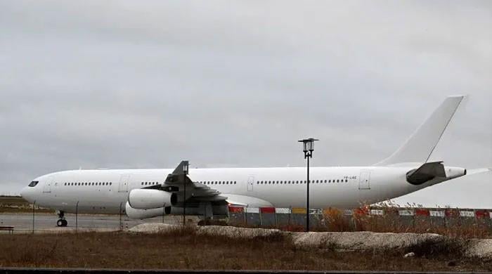 Vehicle collision grounds parked cargo plane at Karachi airport