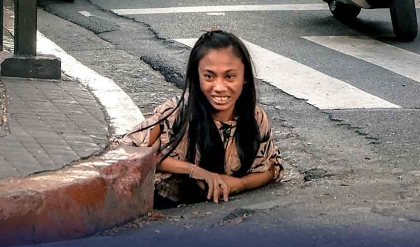 Woman Crawls Out of Drain in the Philippines: A Bizarre Incident