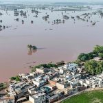 Climate minister attributes flood devastation to