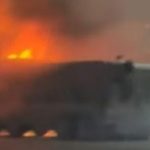 Mob torches seven dump trucks in Karachi after siblings die in accident