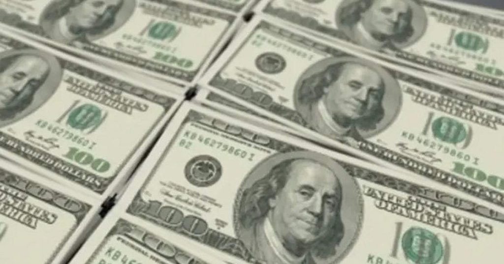 A police investigation is underway after a businessman lost a large sum of money in a dollar scam in Surat.