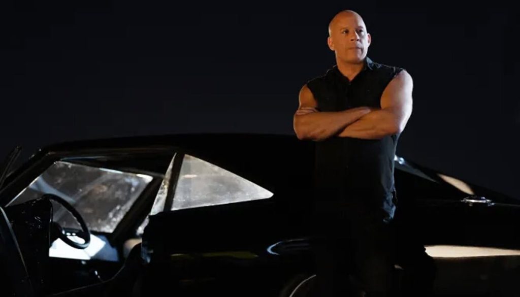 Vin Diesel posing at a promotional event for the Fast and Furious finale which returns to Los Angeles.