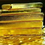 Gold Prices Dip Amid Fed Fears and Stronger Dollar