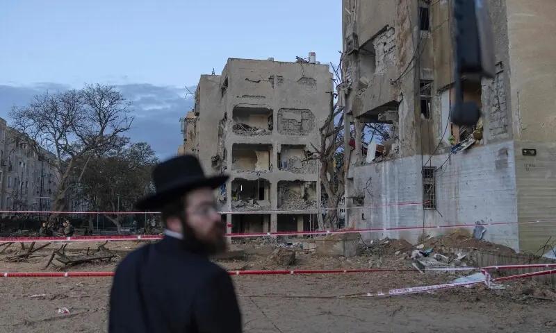 Iran Missiles Hit Israel, Injuring Over 100