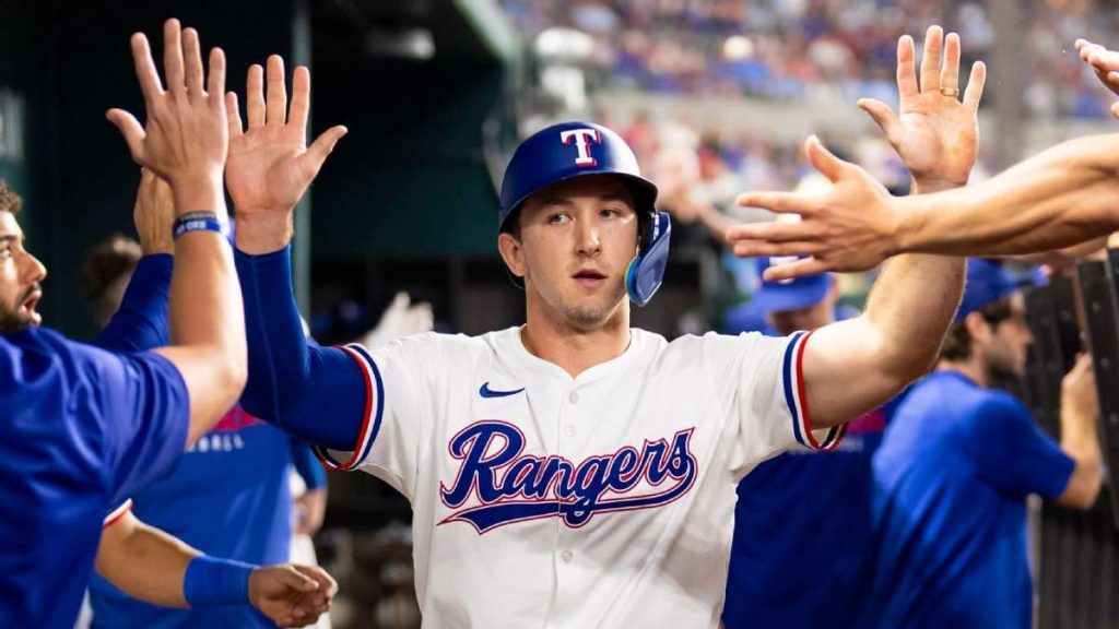 Texas Rangers outfielder Wyatt Langford stands at the plate during a game, highlighting his potential as an American League MVP sleeper.